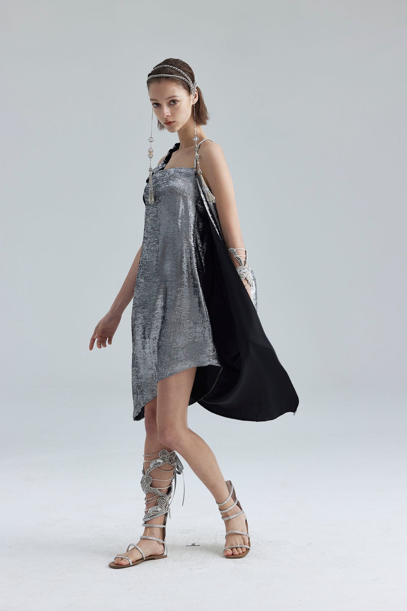 9. The silver asymmetrical structure dress