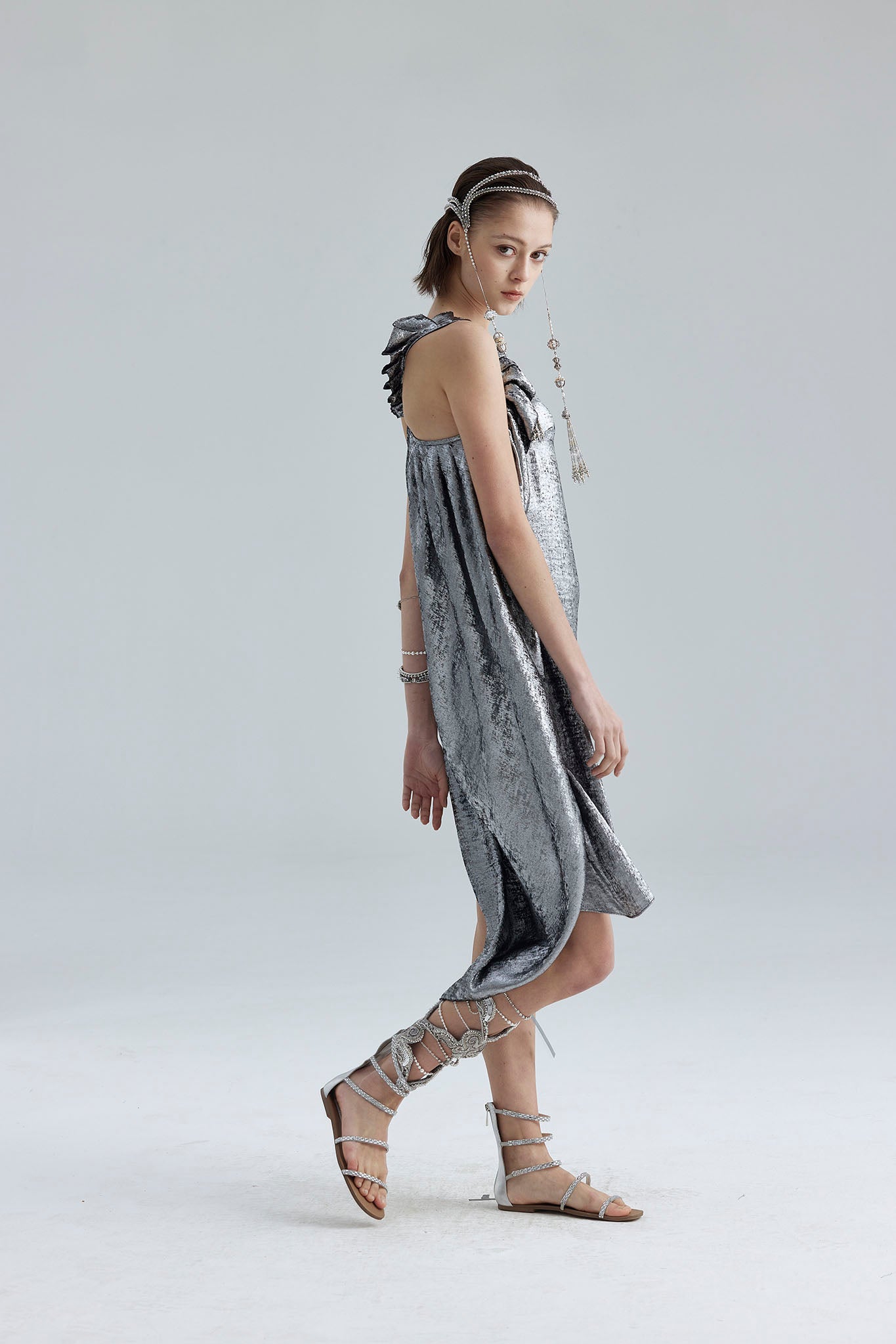 9. The silver asymmetrical structure dress